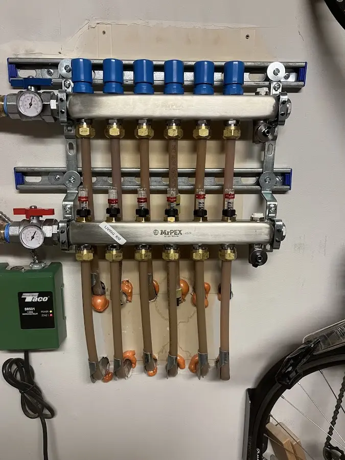 Plumber performing Gas Line Installation at a residential property in Eastham